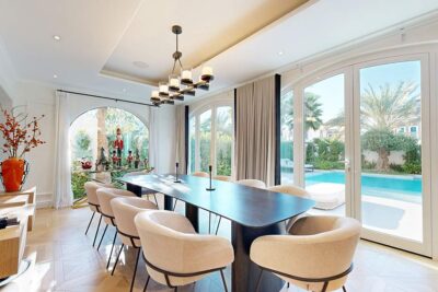 Dubai dining area with pool view, professionally photographed by an interior photographer. Explore stunning interior designs and scenic poolside views in our portfolio.